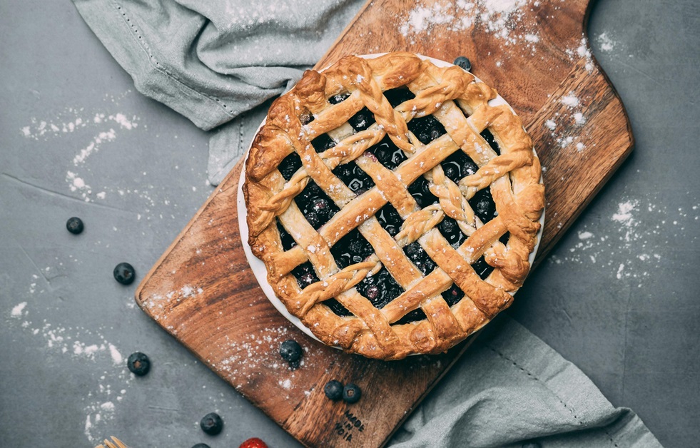 Berry Pie On Top Of Wooden Chopping Board